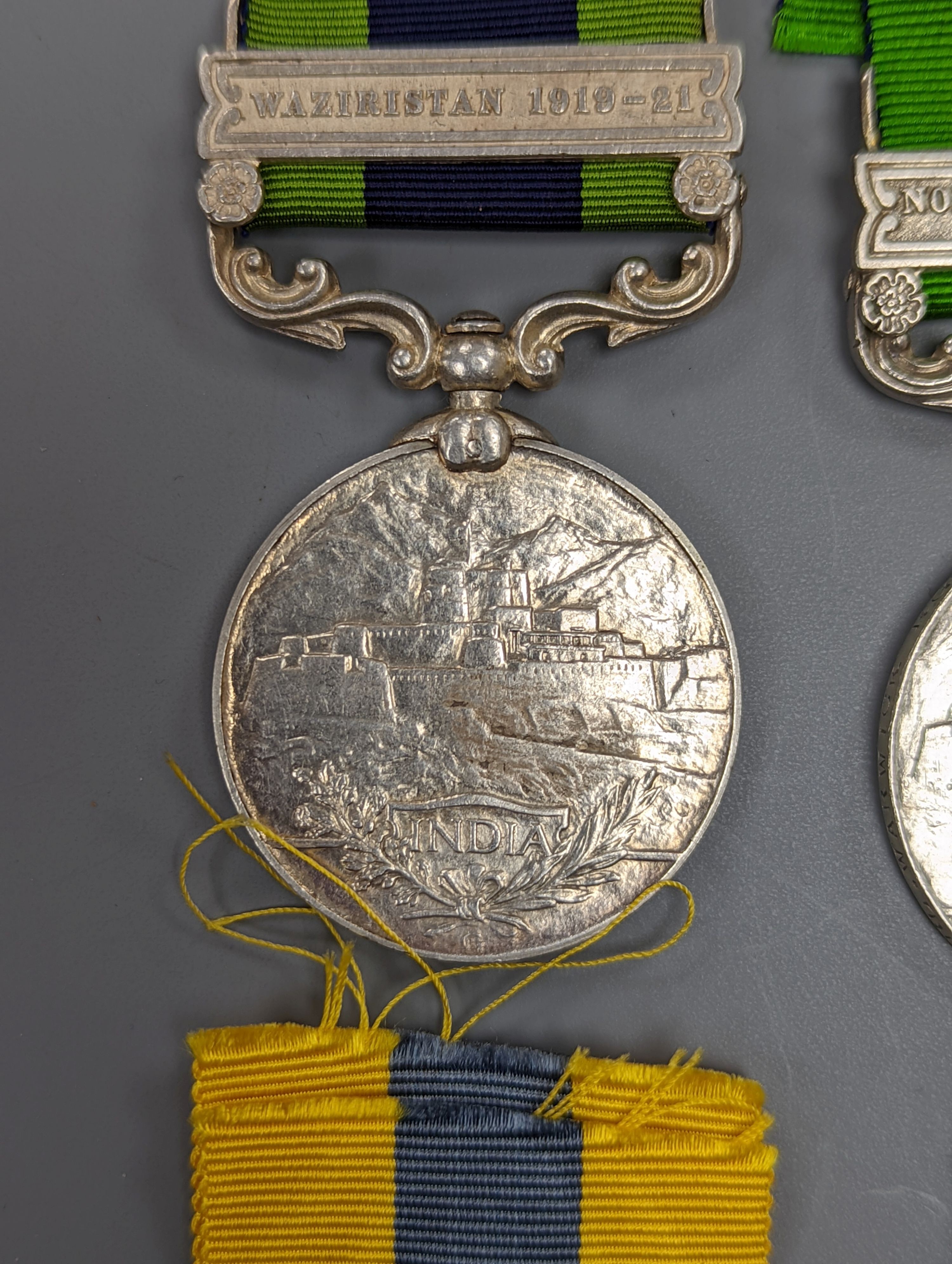 An Edward VII India GSM with North West Frontier 1908 clasp to 678 PTE. G. BAGNELL I/RL WARWICK REGT., a George V India GSM with Waziristan 1919-21 clasp to MTCD-33318 PEON BHAGELLOO I.A.S.C. , a Victoria Sudan medal and